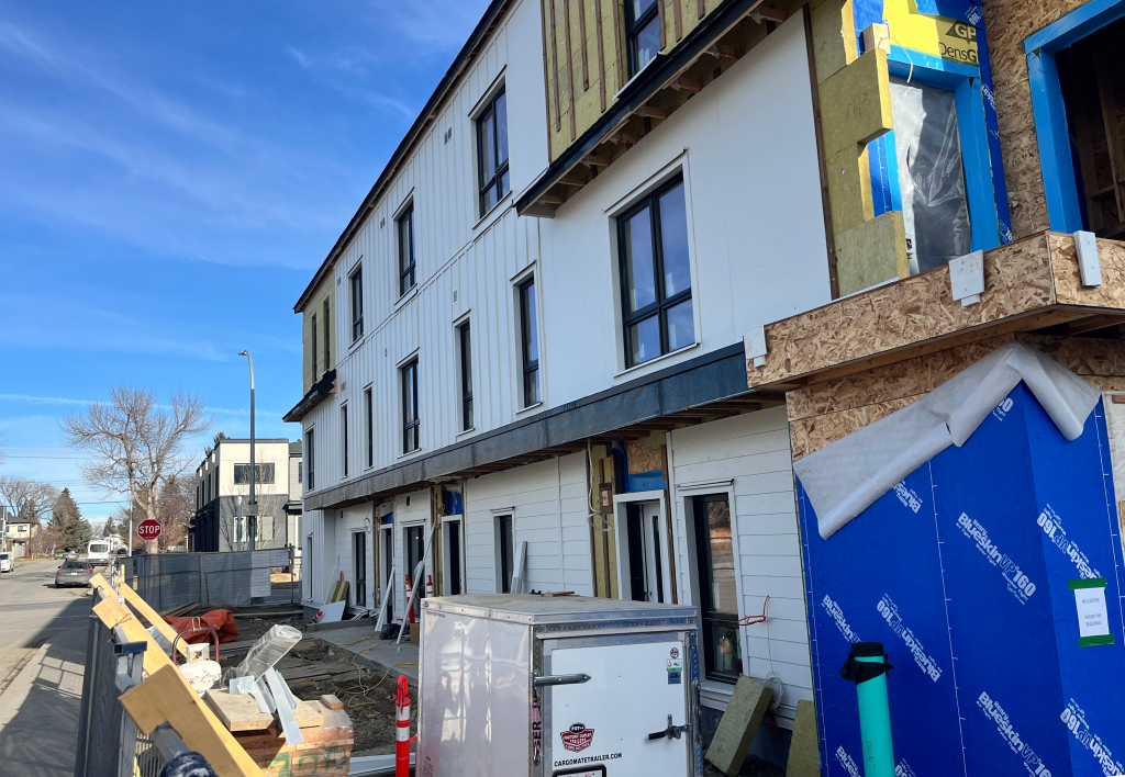Siding on Calgary Housing's Mount Pleasant development is pictured on Feb. 9, 2026.