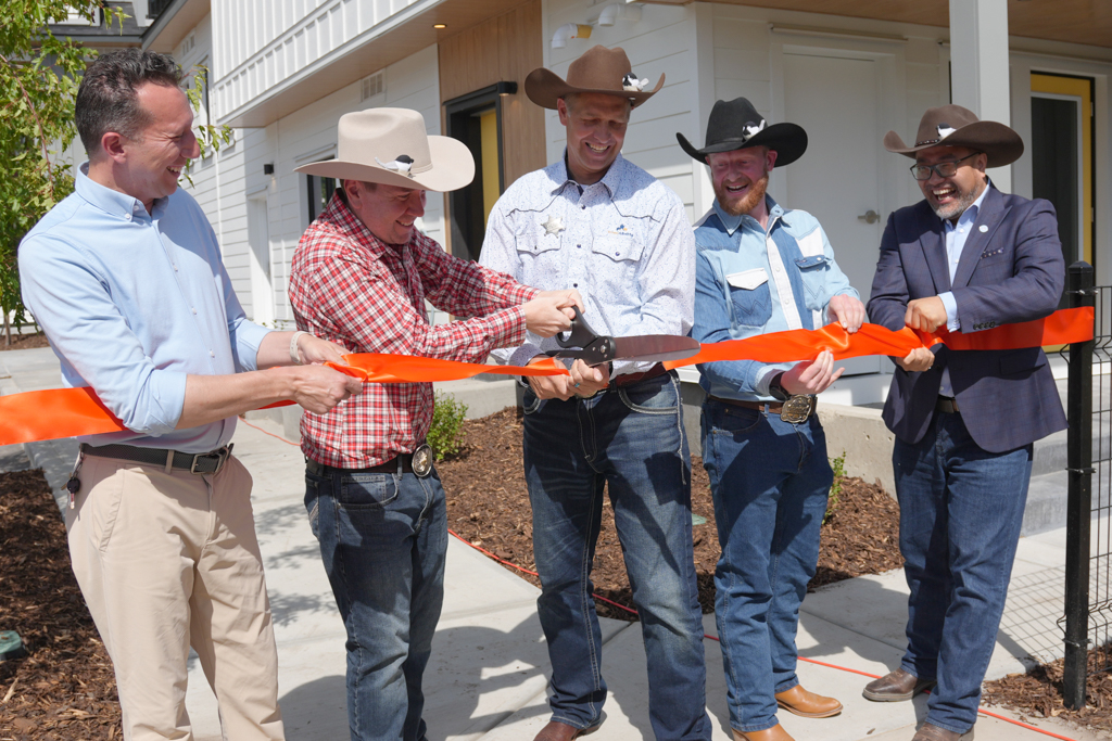Ward 7 Coun. Myke Atkinson, MP for Calgary Confederation and Parliamentary Secretary Corey Hogan, Minister of Assisted Living and Social Services Nathan Neudorf, City of Calgary Chief Housing Officer Reid Hendry and Calgary Housing interim President and CEO Bo Jiang (L to R) are pictured cutting the ribbon at Mount Pleasant on July 9, 2026.